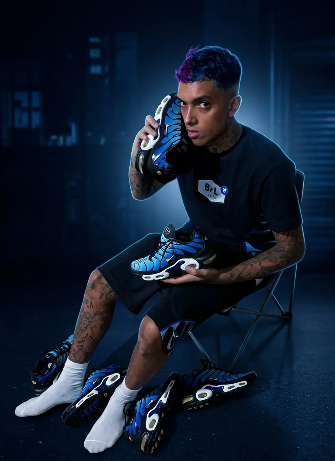 Cliente BrL com coleção de tênis Air Max Plus azul